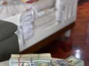 Топ площадок для обмена криптовалют — отзывы a stack of money sitting on top of a white table