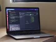 Эффективное использование API в криптотрейдинге a laptop computer sitting on top of a wooden desk