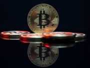 Криптографические методы защиты цифровых активов a bit coin sitting on top of a table