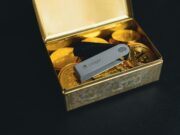 Платформы с кошельками — удобство для трейдеров a swiss army knife sitting in a box of gold coins