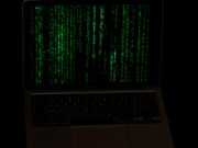 Использование аппаратной криптографии для защиты ключей a laptop with a green screen